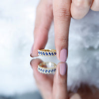 Rosec Jewels blue sapphire and diamond half eternity ring featuring lab-grown blue sapphires and a sleek band design.
