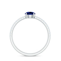 Rosec Jewels 5mm lab-created blue sapphire promise ring with diamond side stones, featuring a polished silver band.