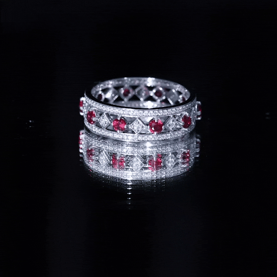 Yellow gold lab-grown ruby vintage wedding band ring with moissanite, featuring intricate detailing and sparkling gemstones.