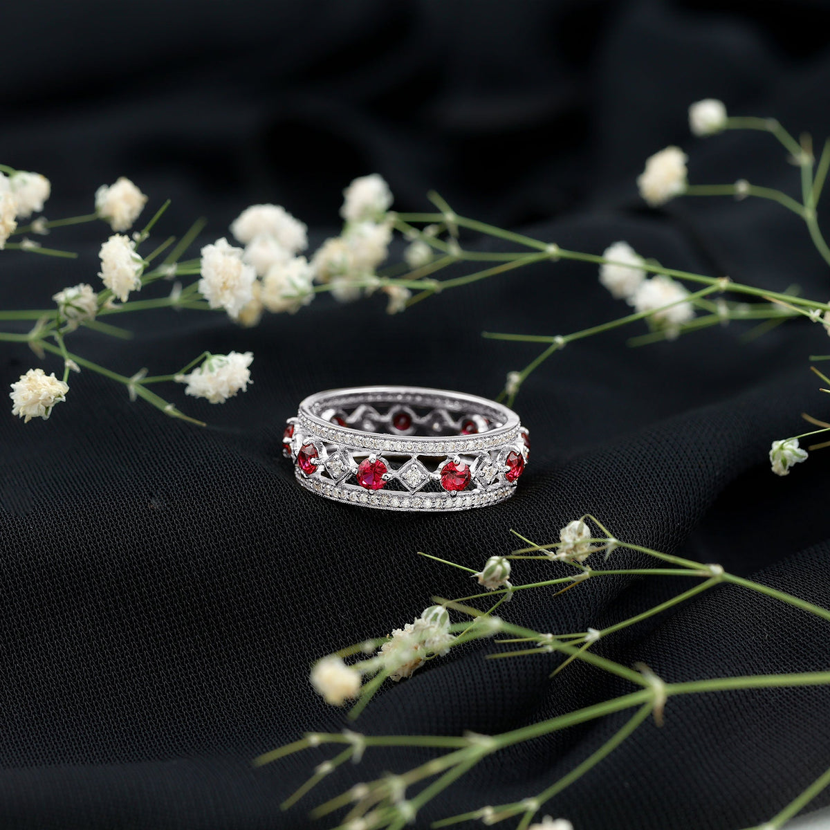 Vintage lab-grown ruby wedding band ring with moissanite stones from Rosec Jewels, showcasing a detailed gold finish and elegant design.
