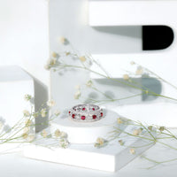 Vintage lab-grown ruby wedding band ring with moissanite gemstones, crafted by Rosec Jewels, showcasing intricate design and sparkling stones.