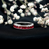 Channel Set Lab Grown Ruby Princess Cut Eternity Band with Milgrain