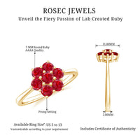 Rosec Jewels lab-created ruby cluster flower ring featuring round cut rubies in a floral design, showcasing intricate craftsmanship.