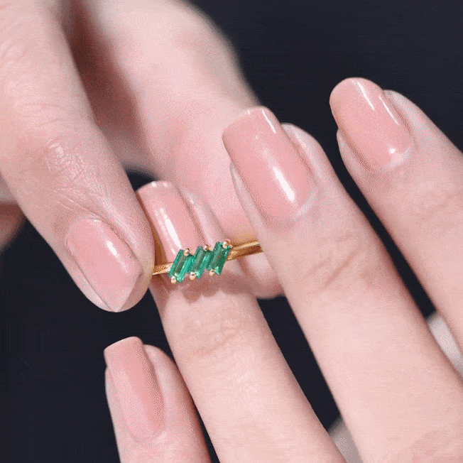 Rosec Jewels Baguette lab-grown emerald 3-stone promise ring with yellow gold band, elegant jewelry for special occasions.