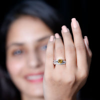 Certified real citrine engagement ring with moissanite wedding band, featuring gold band and sparkling gemstones.
