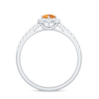 Minimalist Citrine and Diamond engagement ring with halo setting by Rosec Jewels, featuring a sleek band and sparkling stones.