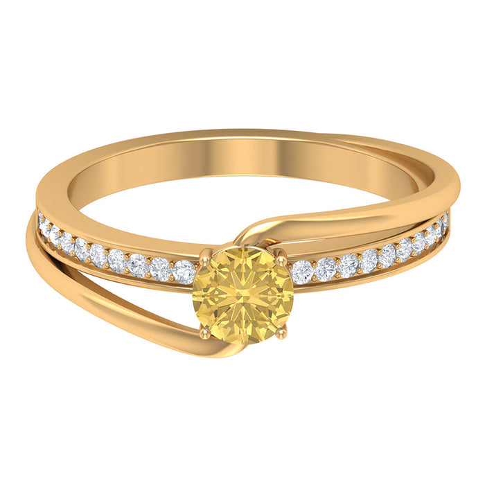 Natural citrine engagement ring with diamond bypass shank by Rosec Jewels, featuring a vibrant yellow gemstone and intricate band design.