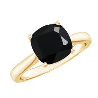 Cushion cut black spinel solitaire engagement ring with a 2-carat center stone, set in a silver band, by Rosec Jewels.