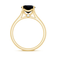 Two-carat cushion cut black onyx solitaire engagement ring from Rosec Jewels showcasing the elegant black gemstone on a silver band.