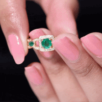 Vintage emerald and diamond engagement ring for women featuring a classic Rosec Jewels design, with green emerald and sparkling diamonds.