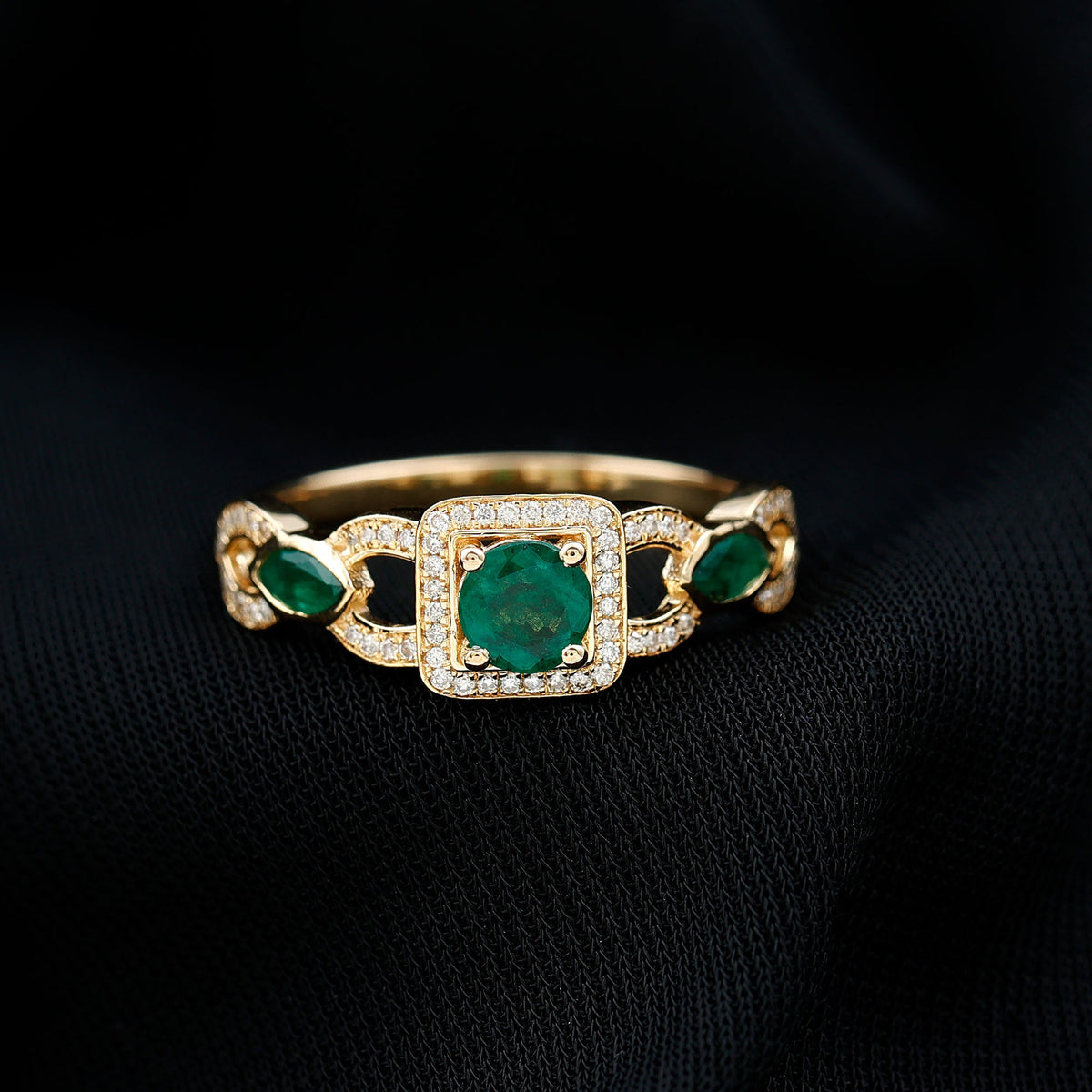 Vintage style emerald and diamond engagement ring for women featuring a Rosec Jewels design with intricate detailing and sparkling gemstones.