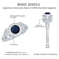 Vintage blue sapphire engagement ring with diamond halo by Rosec Jewels, featuring a detailed design and sparkling gemstones.