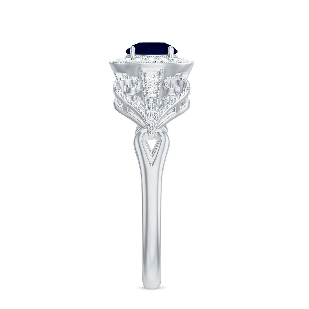 Vintage blue sapphire engagement ring with diamond halo, featuring intricate design and sterling silver band from Rosec Jewels.