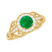 Vintage-inspired engagement ring featuring AAA quality emerald and diamonds by Rosec Jewels, showcasing intricate design and sparkling gemstones.