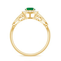 Vintage-inspired engagement ring featuring AAA quality emerald and diamond accents from Rosec Jewels.