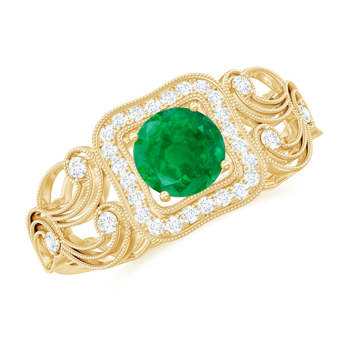 Vintage emerald engagement ring with diamond halo from Rosec Jewels, showcasing detailed metalwork and sparkling gemstones.
