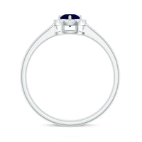 Dainty blue sapphire and diamond floating halo ring by Rosec Jewels, showcasing a delicate band with sparkling gemstones.