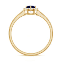 Dainty blue sapphire and diamond floating halo ring by Rosec Jewels, featuring a central sapphire surrounded by sparkling diamonds.