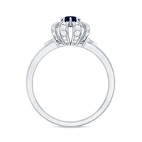 Real blue sapphire flower engagement ring with diamond accents from Rosec Jewels, showcasing intricate floral design and sparkling gemstones.