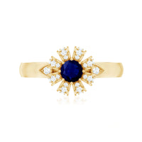 Real blue sapphire flower engagement ring with diamond accents from Rosec Jewels, featuring a detailed floral design and sparkling gemstones.