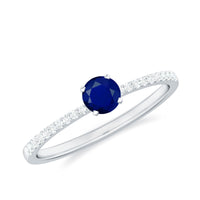 Real 0.9 carat blue sapphire promise ring with diamonds from Rosec Jewels, featuring a gold band and intricate gemstone setting.