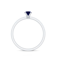 Real 0.9 carat blue sapphire promise ring with diamonds from Rosec Jewels, featuring a silver band and elegant gemstone setting.