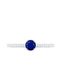 Real 0.9 carat blue sapphire promise ring with diamonds by Rosec Jewels, featuring a silver band and elegant design.