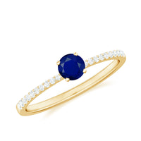 Real 0.9 carat blue sapphire promise ring with diamonds by Rosec Jewels, featuring a central blue sapphire gemstone and diamond accents.