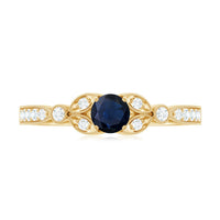Vintage inspired blue sapphire and diamond engagement ring with milgrain details, featuring Rosec Jewels' elegant design.