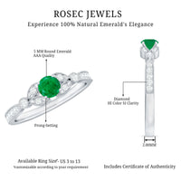 Vintage-inspired natural emerald engagement ring with diamond accents from Rosec Jewels, showcasing detailed craftsmanship and elegant design.