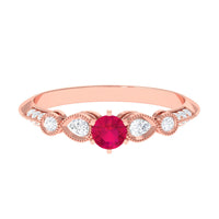 Vintage-inspired genuine ruby engagement ring with diamond accents by Rosec Jewels, featuring intricate metalwork and sparkling gemstones.