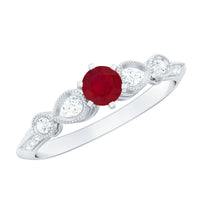 Vintage-inspired engagement ring featuring a genuine ruby and diamond accents by Rosec Jewels, showcasing intricate design and craftsmanship.