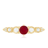 Vintage-inspired engagement ring featuring a genuine ruby and diamond accents by Rosec Jewels, showcasing intricate design and sparkling gemstones.