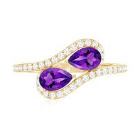 Vintage inspired amethyst and diamond bypass engagement ring by Rosec Jewels, featuring two amethyst stones and intricate band details.