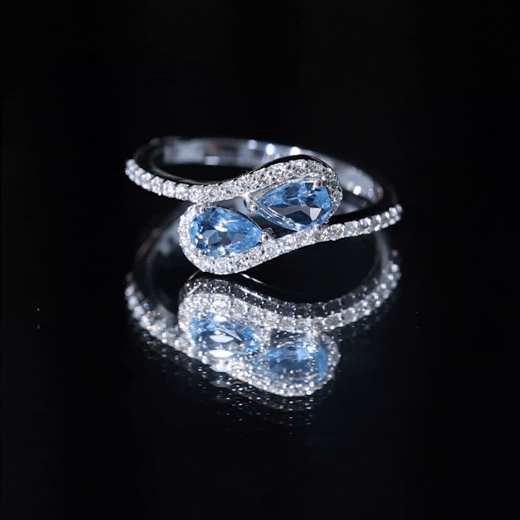 Genuine aquamarine two-stone engagement ring with diamond accents from Rosec Jewels, showcasing the elegant ring design.