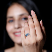Genuine aquamarine two-stone engagement ring with diamonds, crafted by Rosec Jewels, showcasing blue gemstones and sparkling accents.
