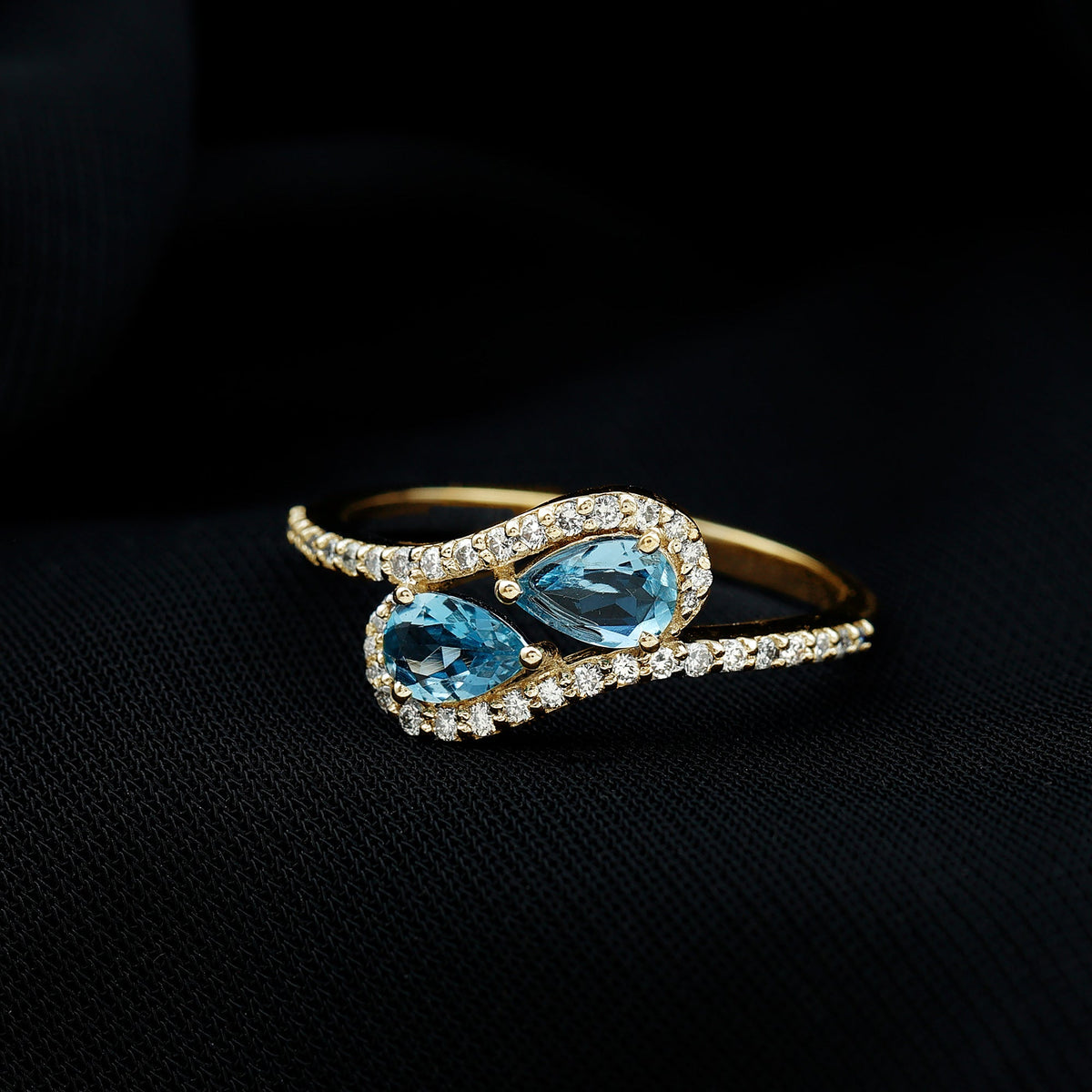 Genuine aquamarine two-stone engagement ring with diamonds from Rosec Jewels, showcasing sparkling blue gemstones and elegant design.