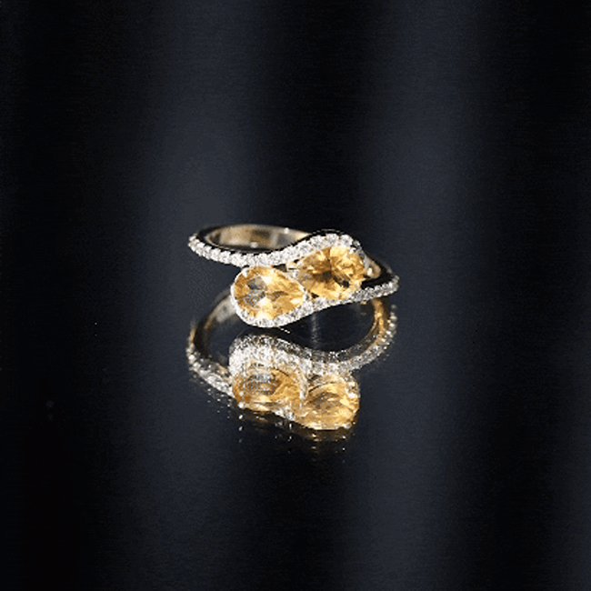 Pear-shaped citrine two-stone engagement ring with diamond accents by Rosec Jewels, showcasing the elegant yellow gemstone design.