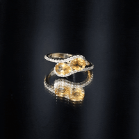 Pear-shaped citrine and diamond engagement ring featuring two stones, crafted by Rosec Jewels.