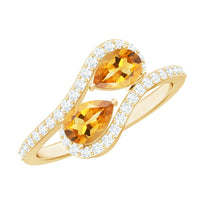 Elegant pear-shaped citrine two-stone engagement ring with diamond accents by Rosec Jewels showing detailed gemstones and band design.