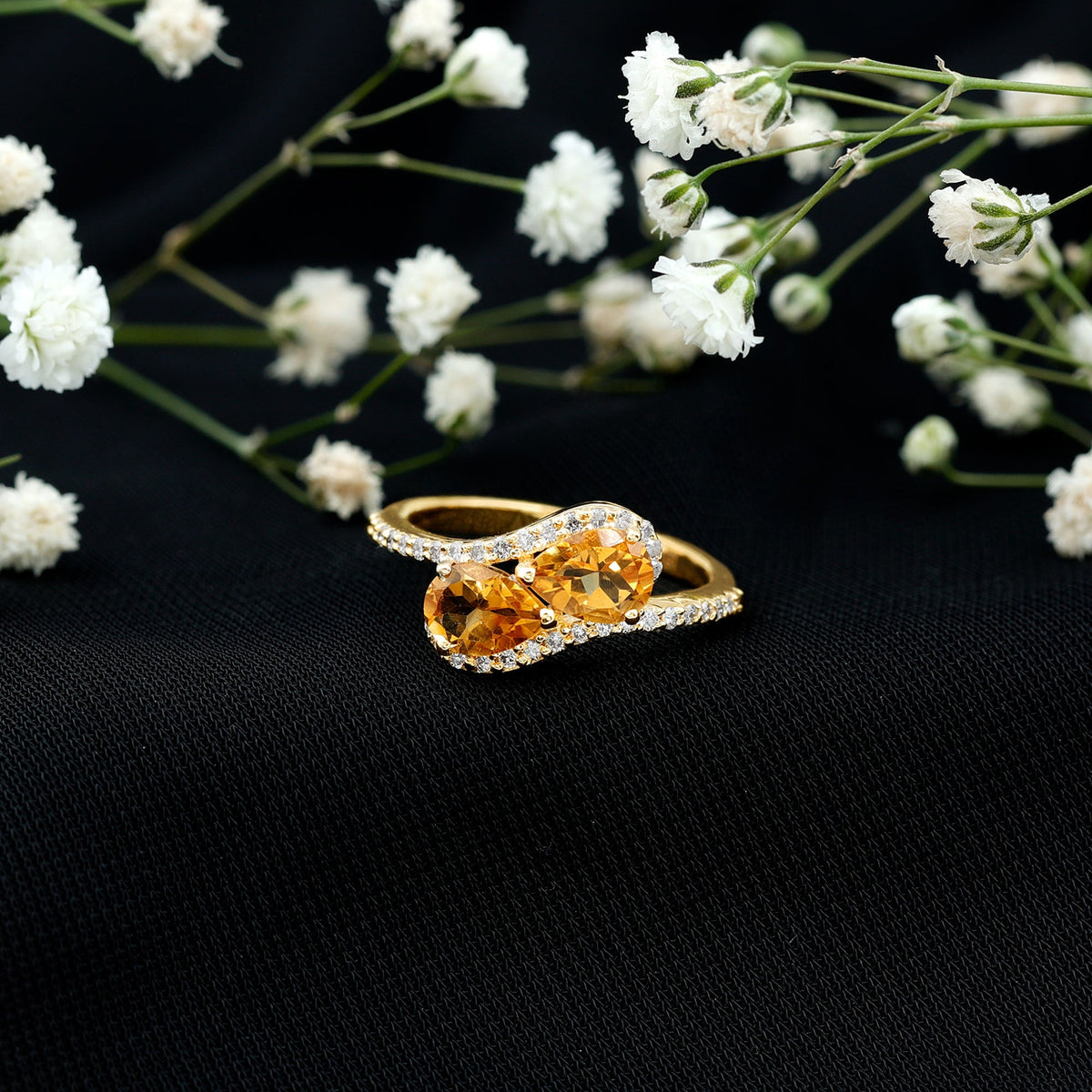Pear-shaped citrine two-stone engagement ring with diamond accents, crafted by Rosec Jewels, showcasing the elegant jewelry design.