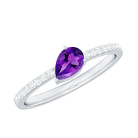 Natural 1 Carat pear-shaped amethyst engagement ring with diamond accents from Rosec Jewels, showcasing the elegant gemstone and band.