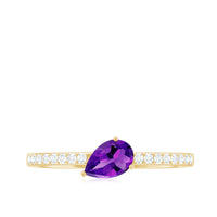 Pear-shaped amethyst engagement ring with diamond accents from Rosec Jewels, featuring a natural 1-carat gemstone and intricate band details.