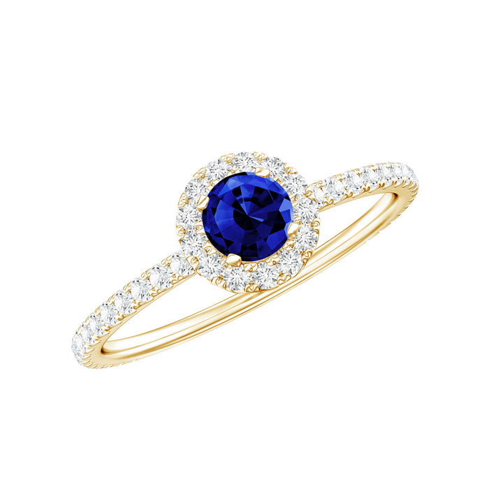 Lab grown blue sapphire and diamond minimal engagement ring by Rosec Jewels, featuring a sleek band and elegant gemstone setting.