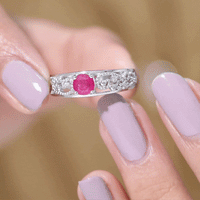 Vintage-style engagement ring with a natural 0.6 carat ruby and diamond accents in a Rosec Jewels ring design.