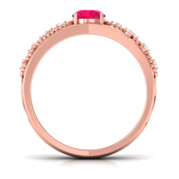 Vintage-style engagement ring with a 0.6 carat natural ruby and diamond accents, crafted by Rosec Jewels.