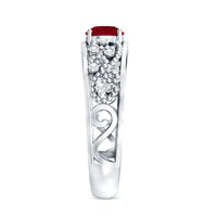 Natural 0.6 carat ruby vintage engagement ring with diamond accents from Rosec Jewels, showcasing intricate design and sparkling gemstones.