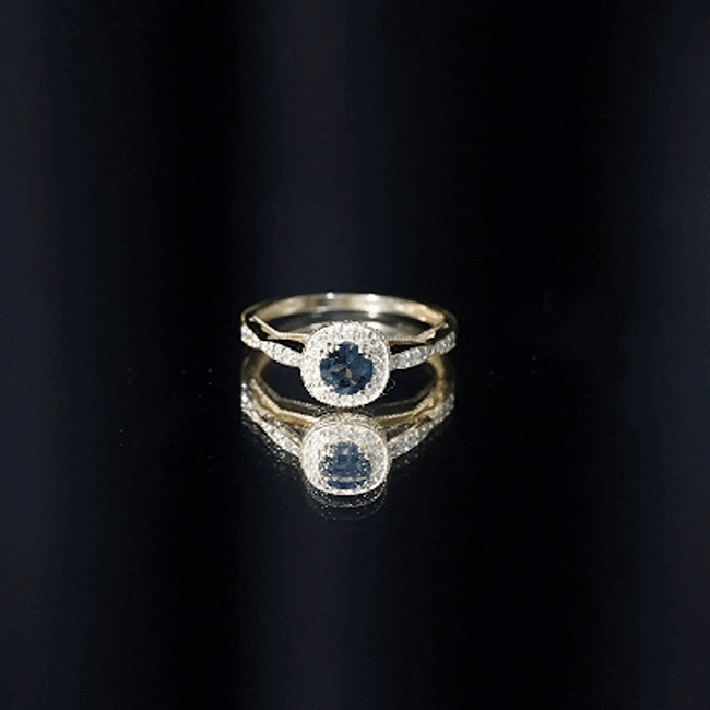 Vintage-inspired 0.6 carat London Blue topaz ring with diamond halo by Rosec Jewels, showcasing intricate design and sparkling accents.
