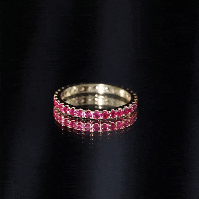 Rosec Jewels lab-grown ruby stackable eternity ring with French pave setting, featuring sparkling red rubies and a sleek band design.