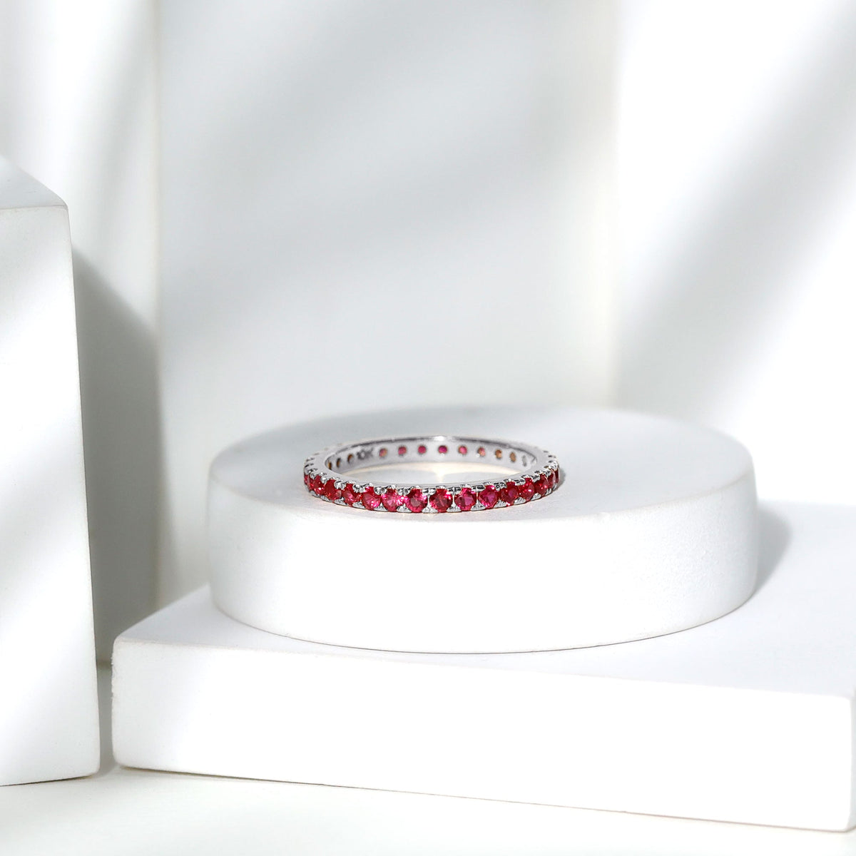 Rosec Jewels lab-grown ruby eternity ring with French pave-set rubies, stackable design, elegant and sparkling jewelry ring.